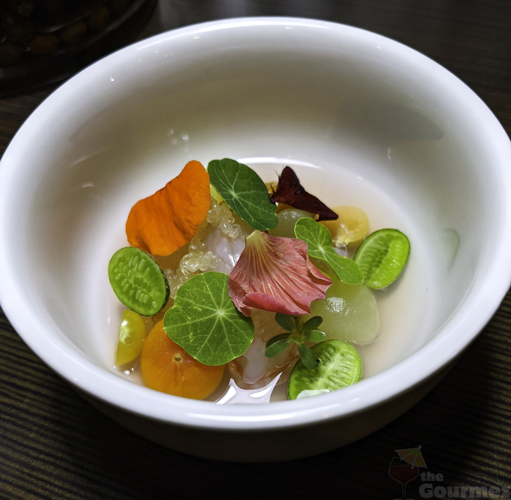 A bowl of greens and lychee